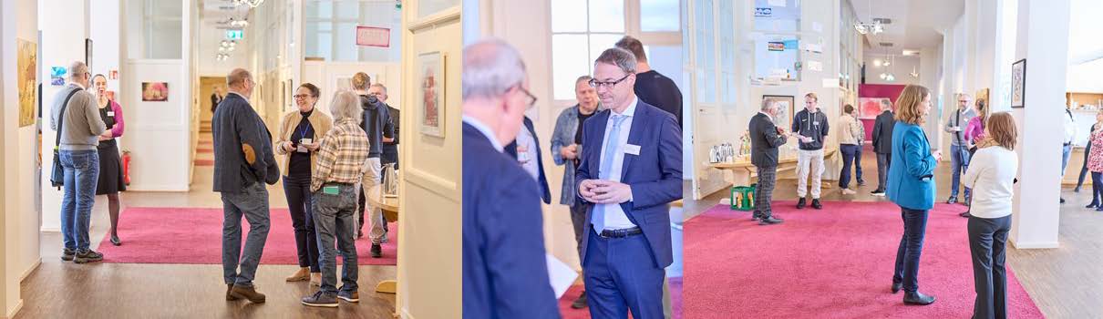 V.l.n.r. Mitarbeitende und Gäste im Gespräch, mittig Marco Mahling